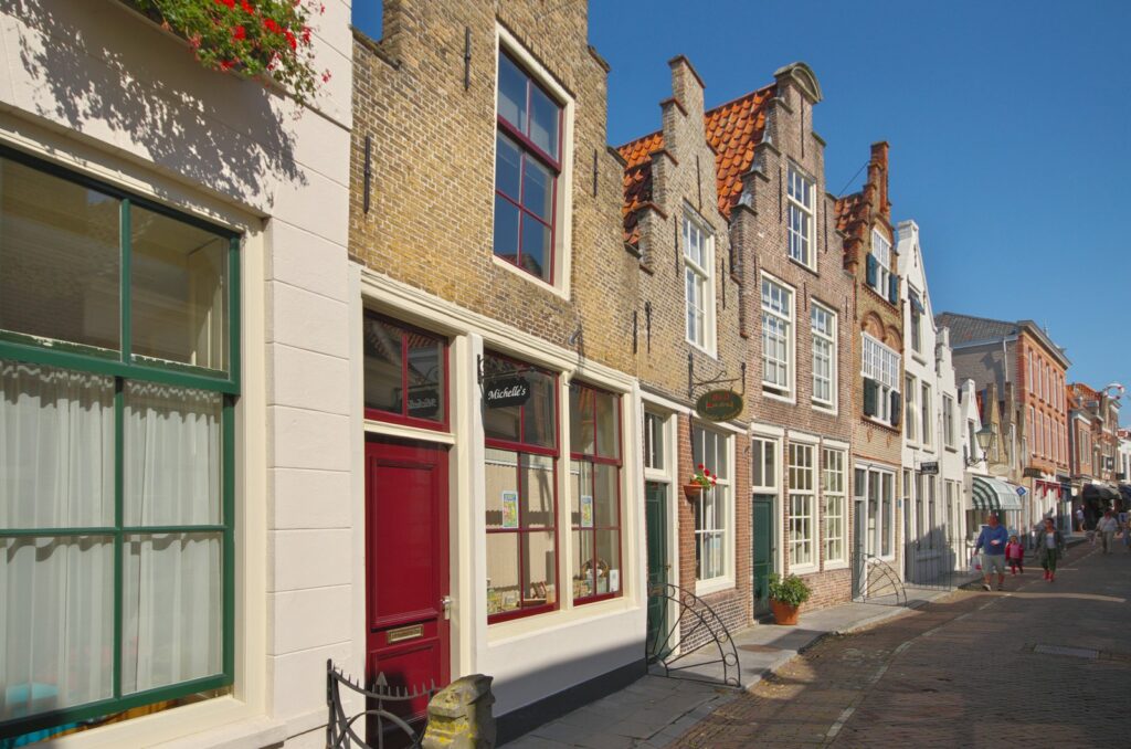 a row of buildings on a city street